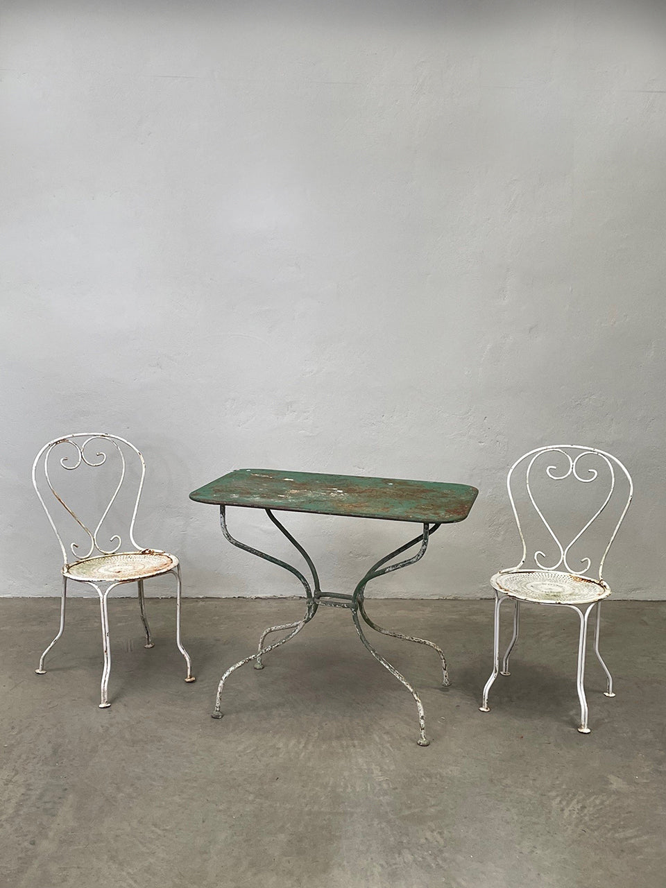 Garden table, and pair of chairs (priced separately, from) (Table: SOLD)