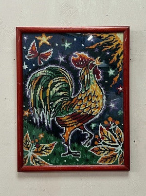 Cockerel in frame