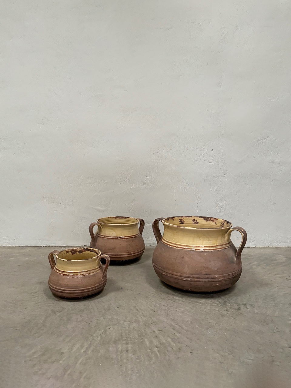 Trio of terracotta pots