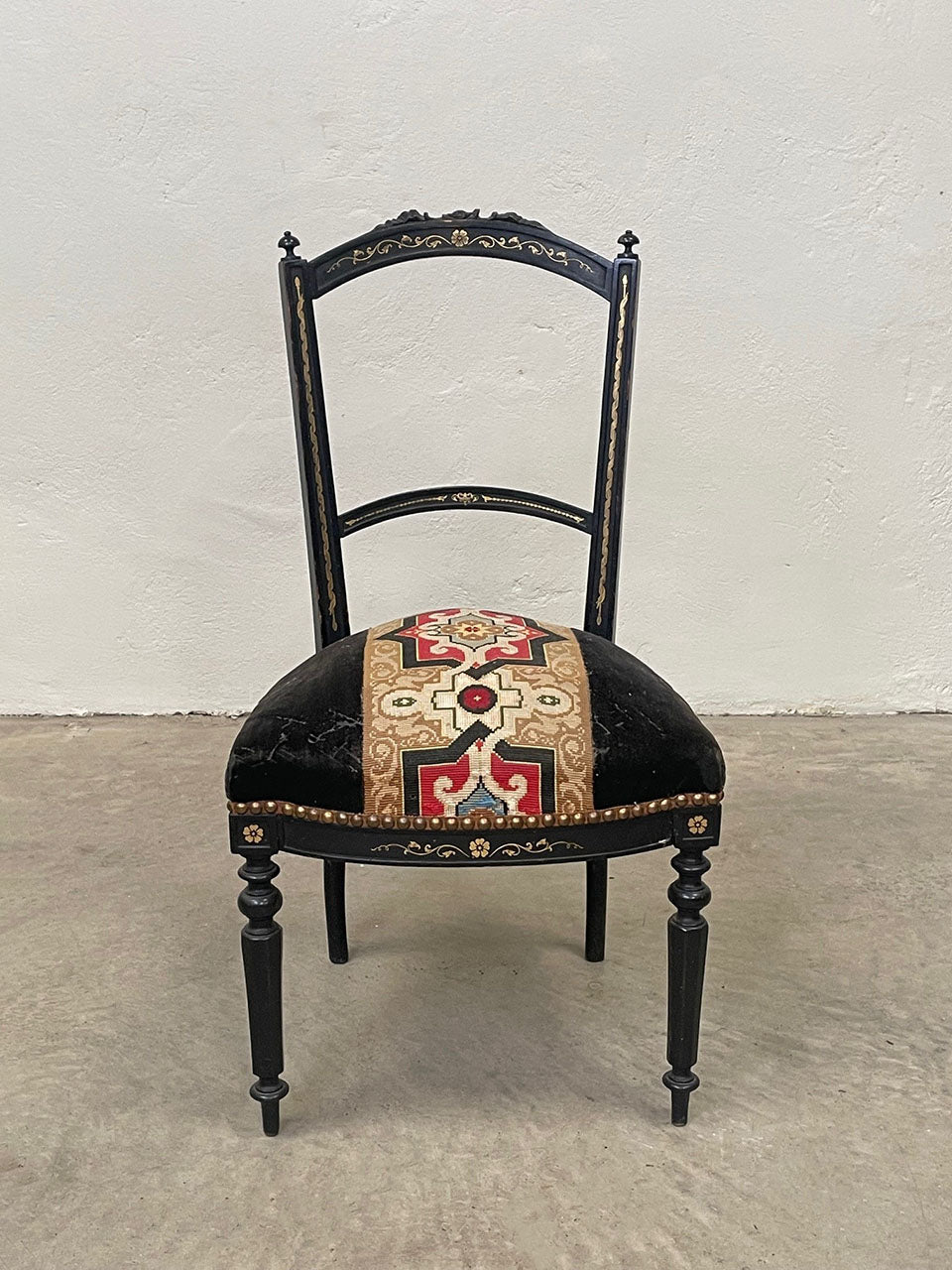 Gilded ebonised chair