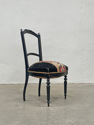 Gilded ebonised chair