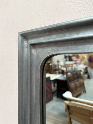 Mirror in a pewter frame