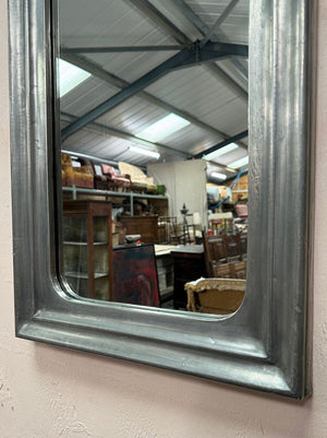 Mirror in a pewter frame