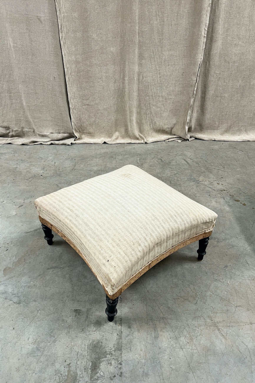 Concave footstool (inc. re-upholstery, excluding fabric)