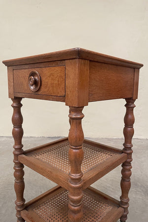 Cane tiered side table with marble top