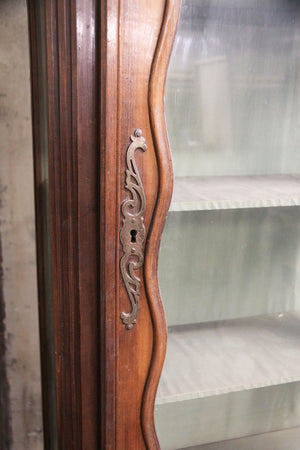 Two-part tall oak glazed cabinet