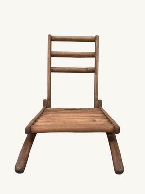 Low slatted chair