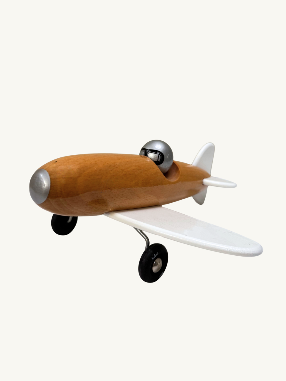 White toy plane by Vilac