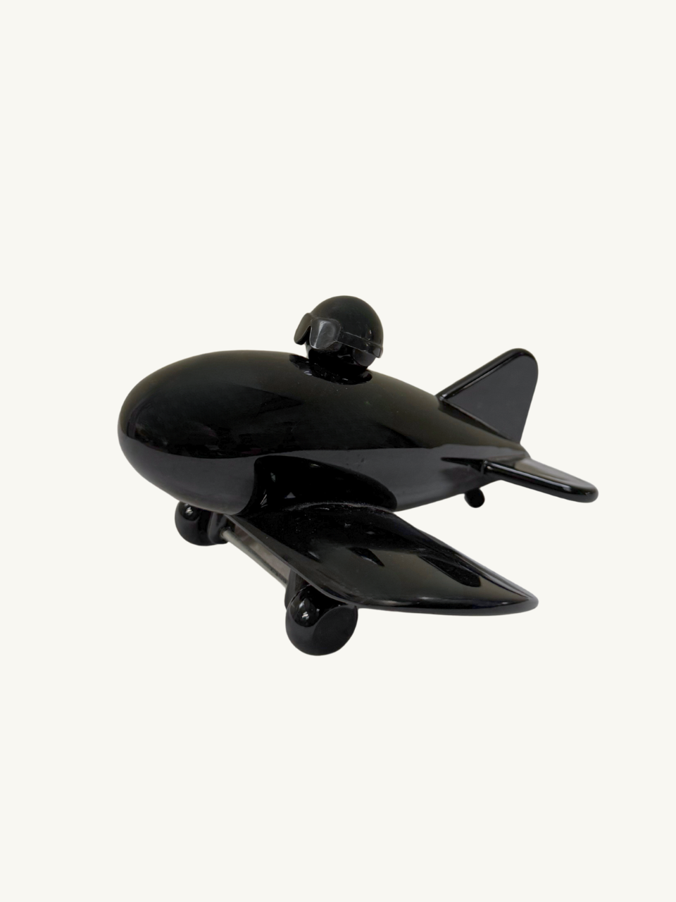 Black toy plane by Playsam Sweden