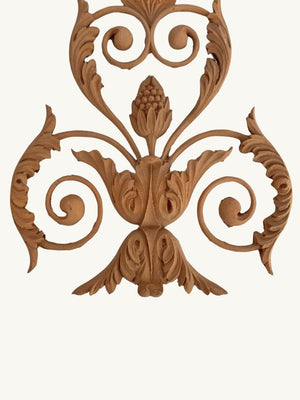 Pair of carved decorations