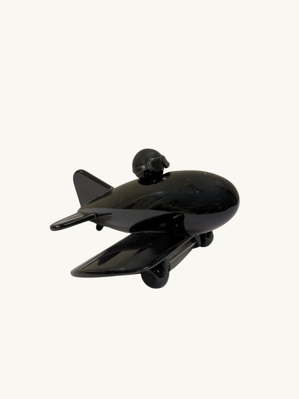 Black toy plane by Playsam Sweden