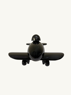 Black toy plane by Playsam Sweden