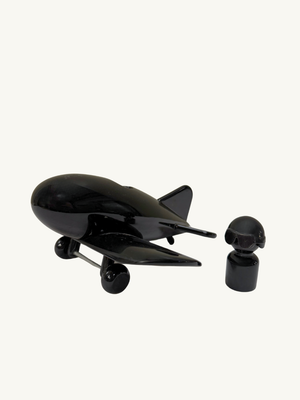 Black toy plane by Playsam Sweden