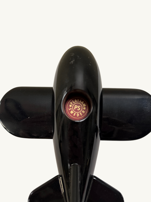 Black toy plane by Playsam Sweden