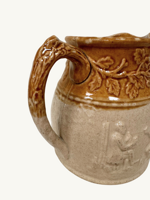 Embossed stoneware jug