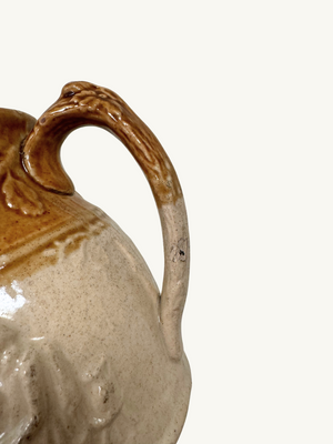 Embossed stoneware jug