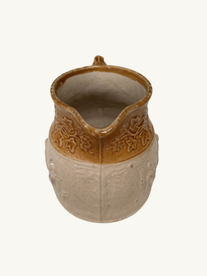 Embossed stoneware jug