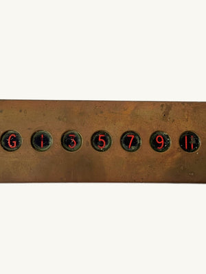 Elevator plaque
