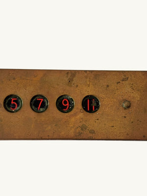Elevator plaque