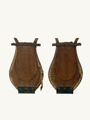 Pair of lyre shaped mirrors