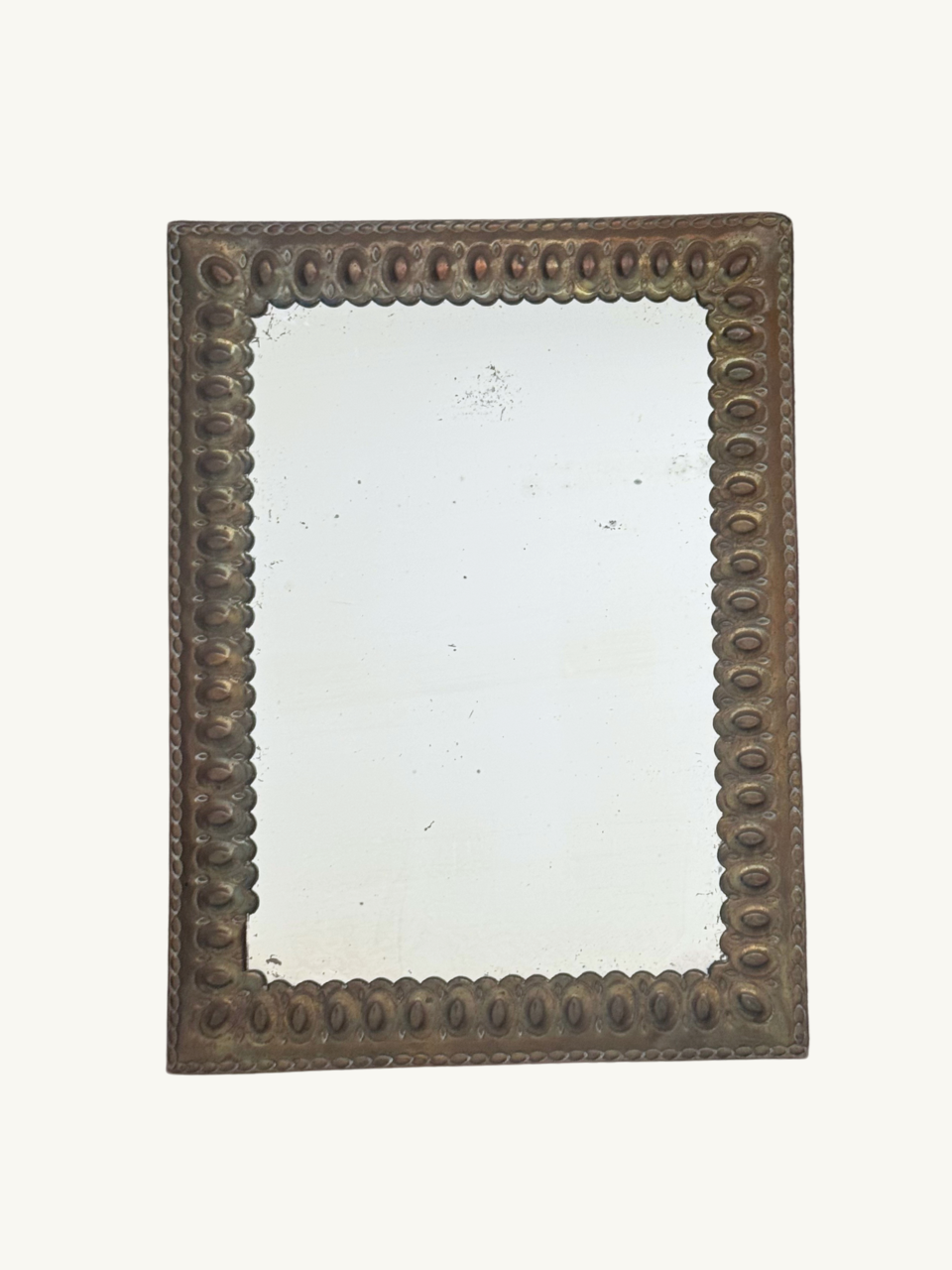 Ornate brass mirror