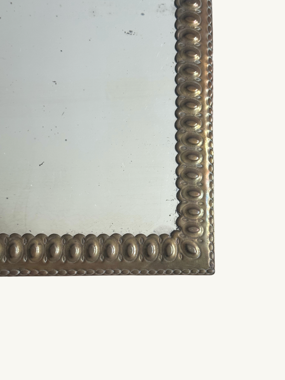 Ornate brass mirror