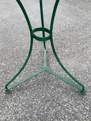 Green metal bistro table