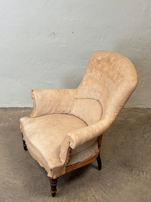 Curved back armchair