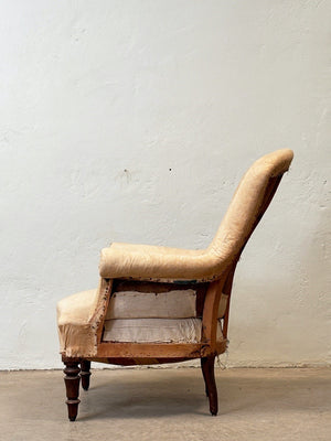 Curved back armchair