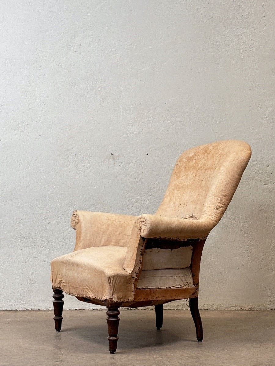 Curved back armchair