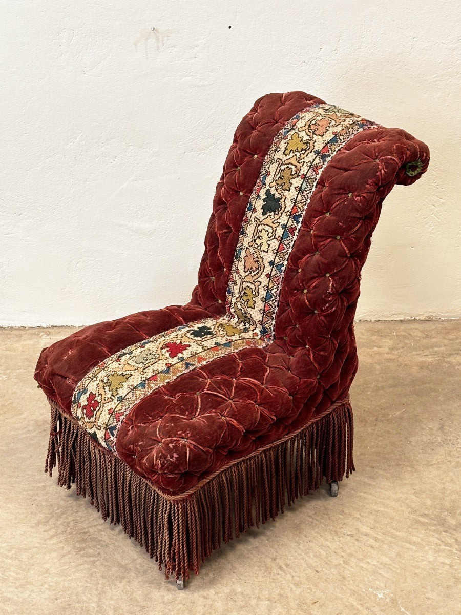 Deep buttoned occasional chair