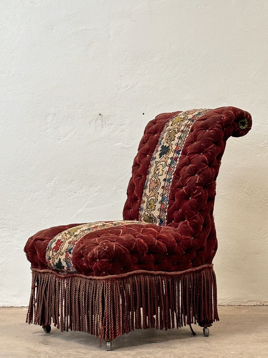 Deep buttoned occasional chair