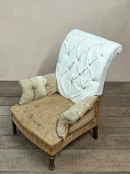 Deep buttoned scroll back armchair (re-upholstered, ex. fabric)
