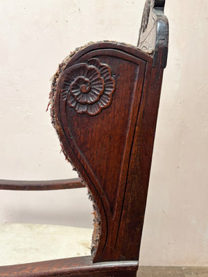 Early oak wing armchair