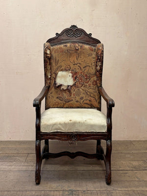 Early oak wing armchair