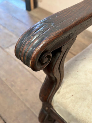 Early oak wing armchair