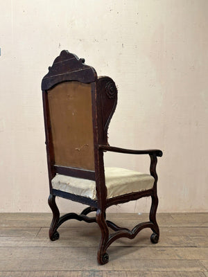 Early oak wing armchair