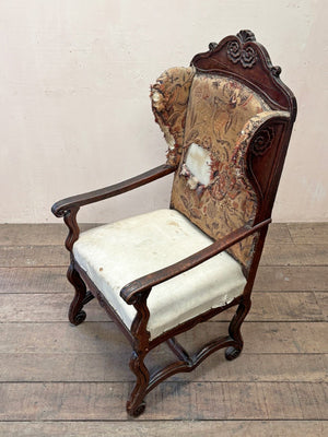 Early oak wing armchair