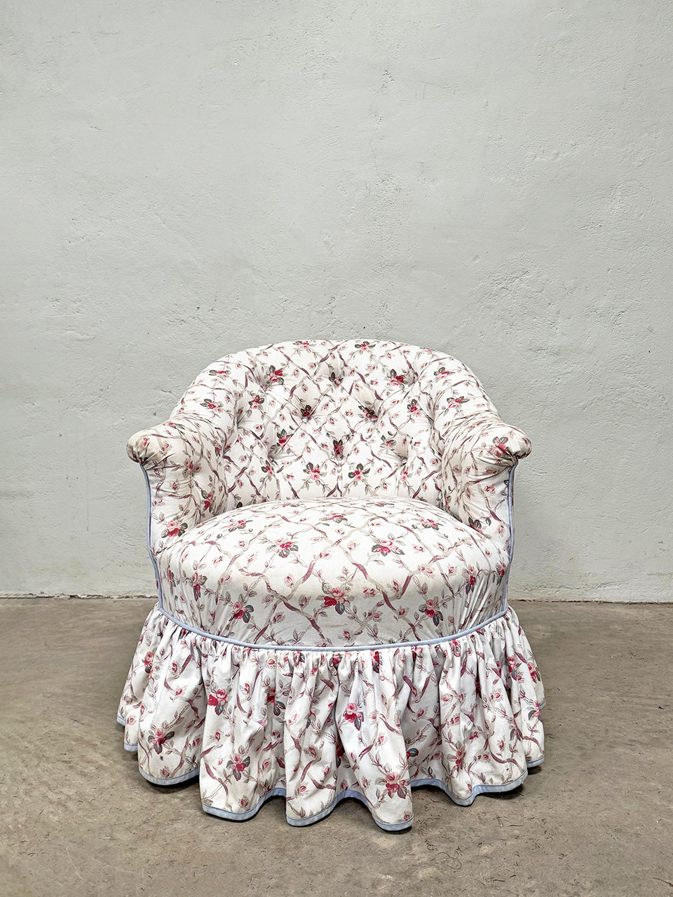 Low back crapaud armchair
