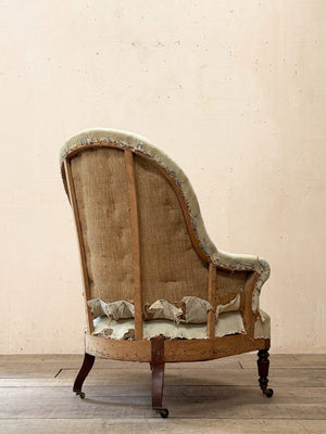 High back armchair with fluted legs