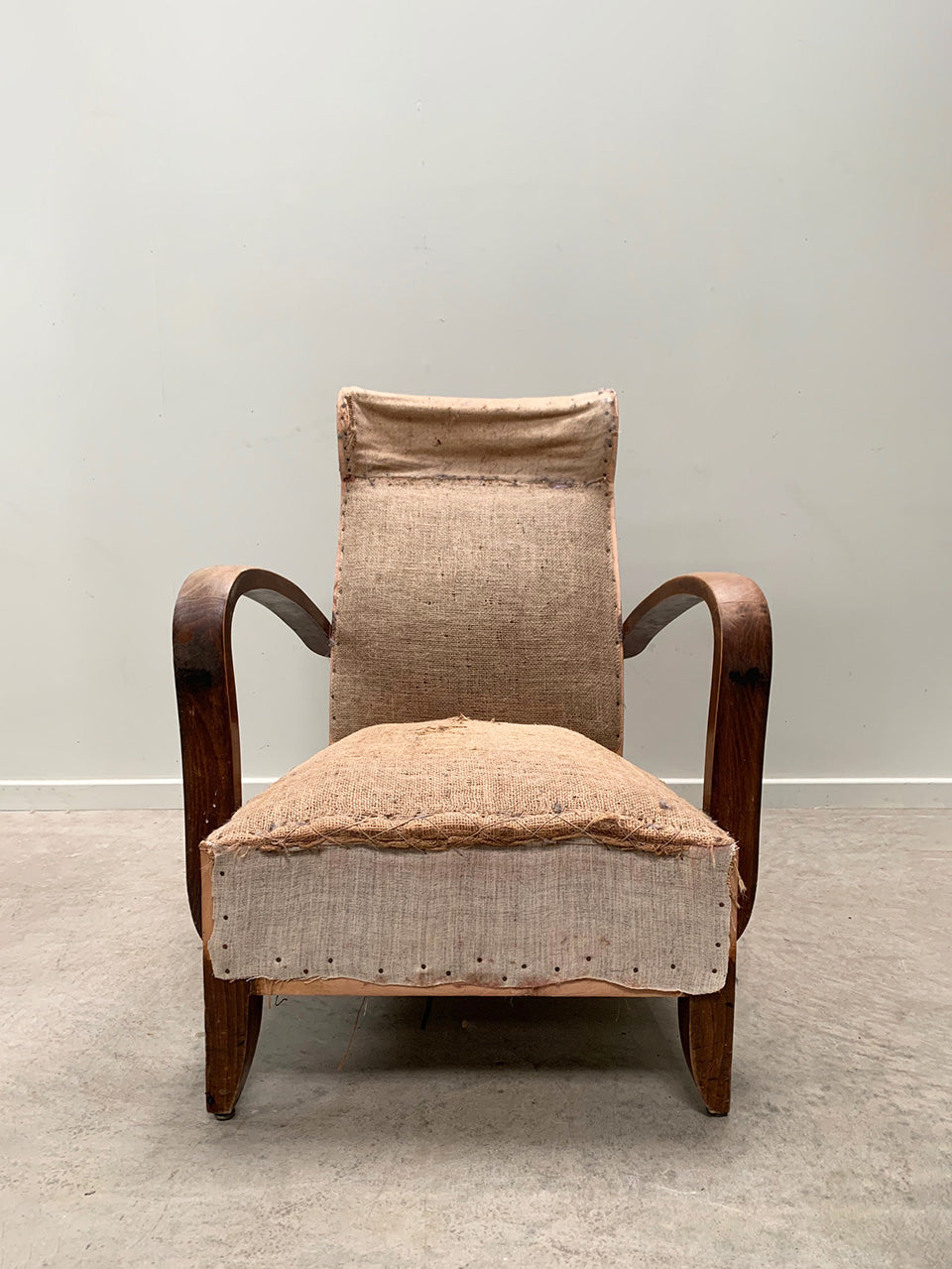 Curved open armchair with headrest 'as is'