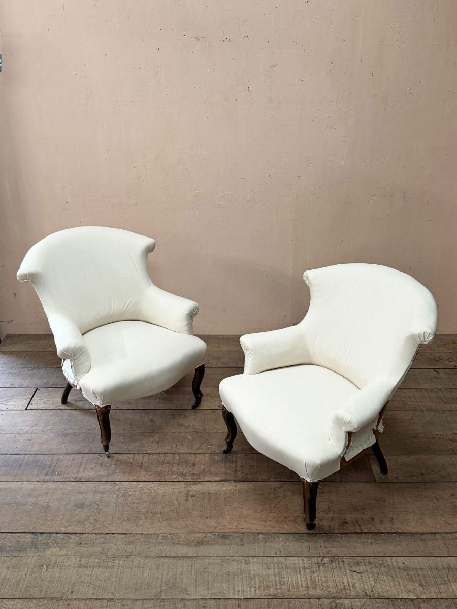 Pair of chapeau de gendarme armchairs