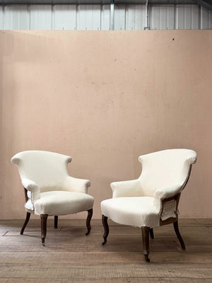 Pair of chapeau de gendarme armchairs