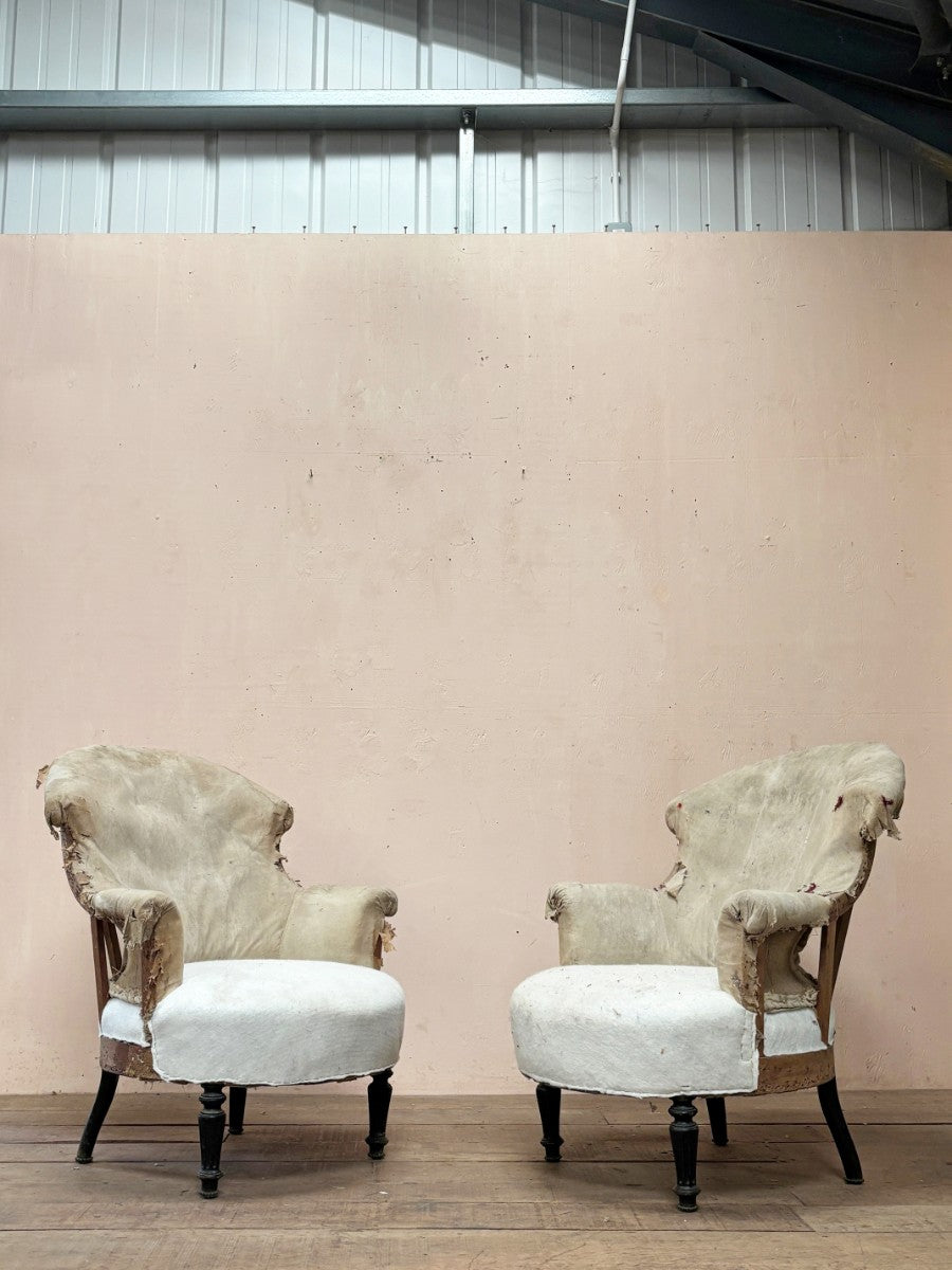 Pair of chapeau de gendarme armchairs (inc. re-upholstery, ex. fabric)