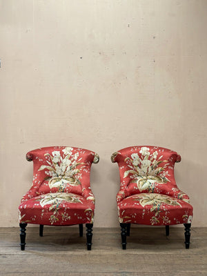 Pair of floral chauffeuse chairs