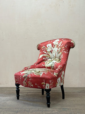 Pair of floral chauffeuse chairs