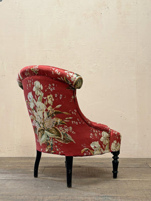 Pair of floral chauffeuse chairs