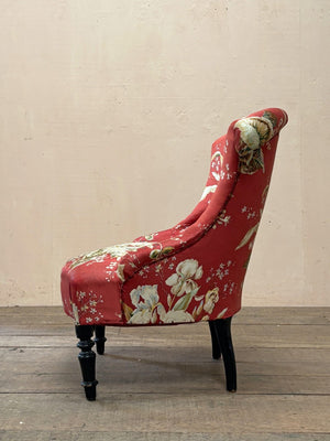 Pair of floral chauffeuse chairs