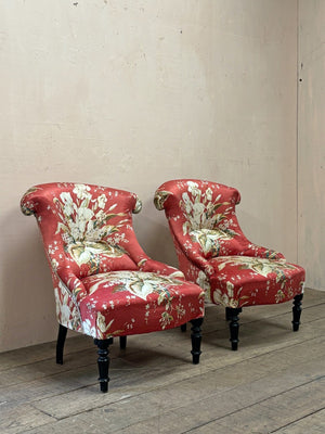 Pair of floral chauffeuse chairs