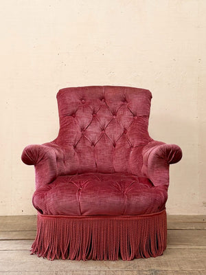 Pair of deep buttoned armchairs